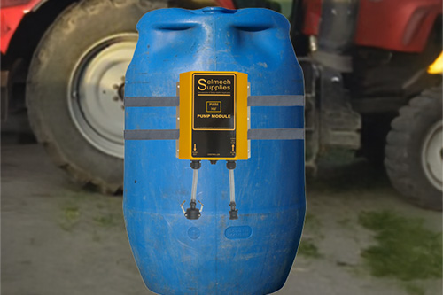 Basic silage applicator module strapped to a 200 litre barrel