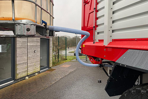 400 litre tank being filled from IBC